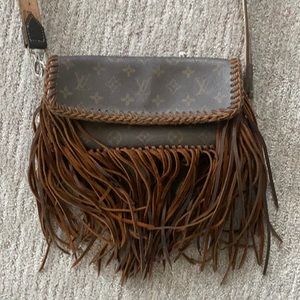 Authentic tricked out, fringe Louis Vuitton with one of a kind crossbody strap